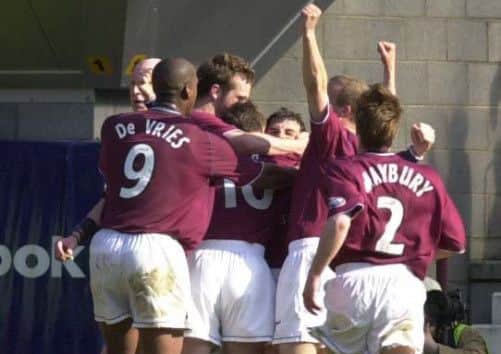 Austin McCann and teammates celebrate his winning goal. Picture: Phil Wilkinson