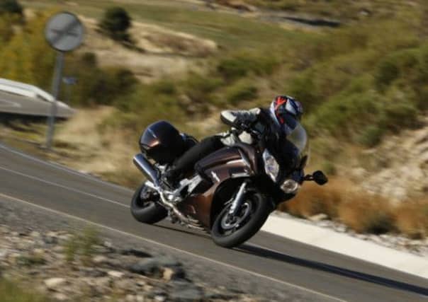 The suspension of the FJR feels luxurious, but screen protection and menu access are frustrating