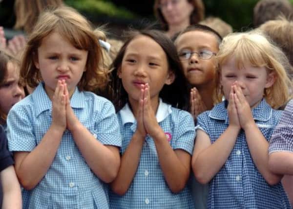 The removal of prayer and assemblies from schools is under discussion. Picture: PA.