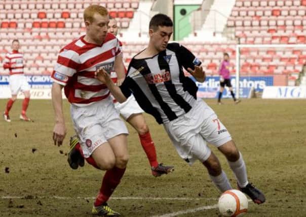 The plight of Scottish football, and teams like Dunfermline, is a metaphor for the whole of Scottish society argues Michael Kelly. Picture: SNS