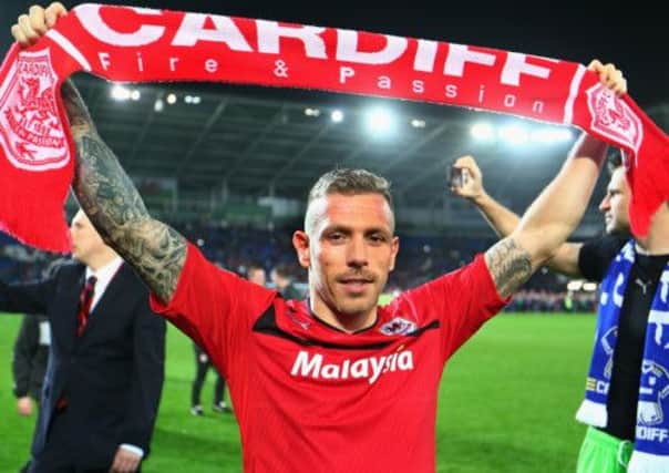 Craig Bellamy of Cardiff City celebrates his team's promotion to the Premier League. Picture: Getty