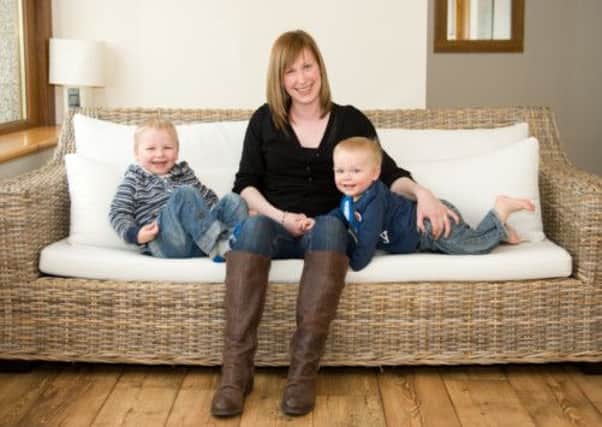 Helen Inkster and her two boys. The inksters have taken out income protection insurance. Picture: TSPL