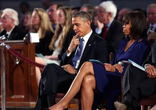 President Barack Obama and first lady Michelle Obama at the prayer service. Picture: Getty