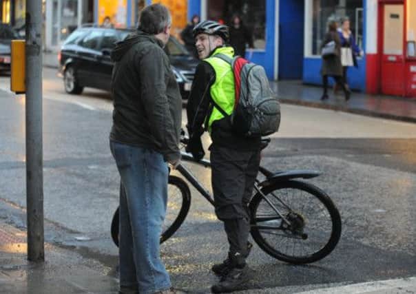 Cyclists want civil law changed to make compensation for injuries easier to claim. Picture: Neil Hanna