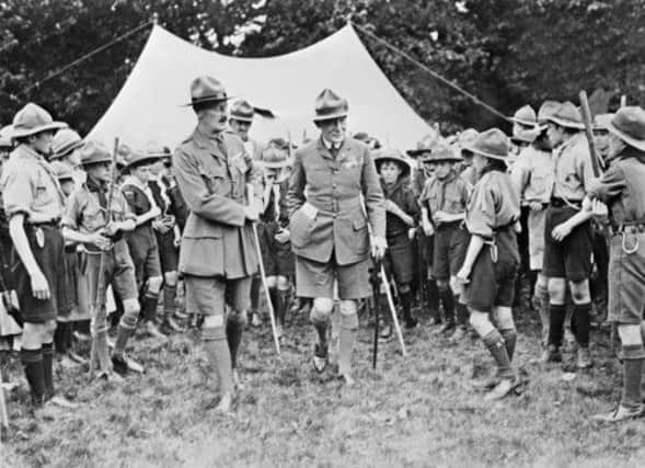 Lord Baden-Powell, centre, founder of the Scout movement, at a camp in the early days. Picture: Getty