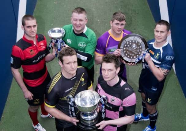 The captains of the finalists line up with the Cup, Shield and Bowl at Murrayfield. Picture: SNS