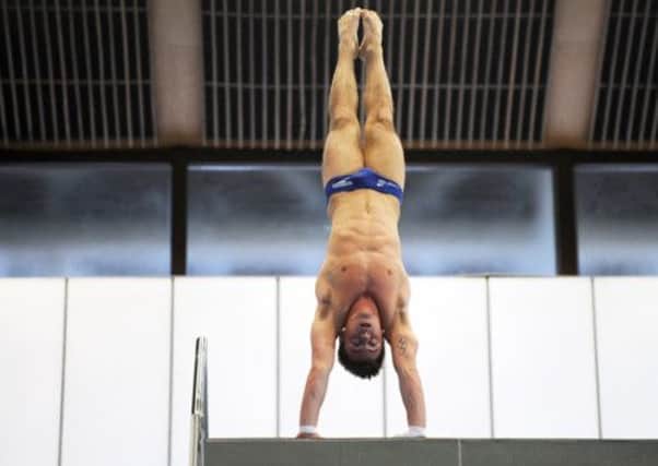 Tom Daley during practice at the Royal Commonwealth Pool ahead of the FINA/Midea Diving World Series 2013. Picture: Jane Barlow
