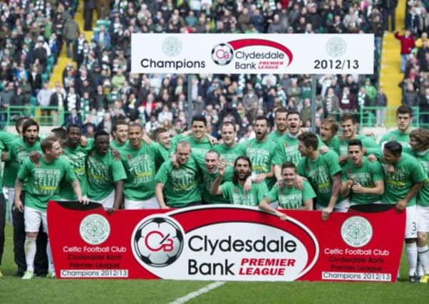 Celtic players celebrate after being crowned Clydesdale Bank Premier League Champions. Picture: SNS
