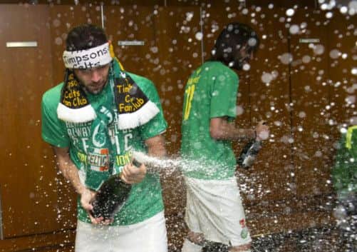 Celtic's Joe Ledley celebrates in the dressing room. Picture: SNS
