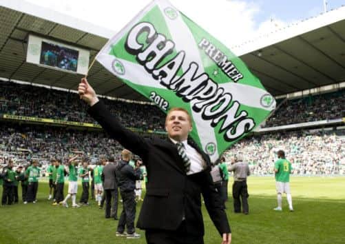 Neil Lennon celebrates his side's Clydesdale Bank Premier League title. Picture: SNS
