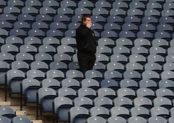 Melrose coach Craig Chalmers is alone with his thoughts at Murrayfield. Picture: Neil Hanna