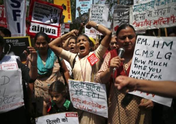 Women protest near Parliament over the authorities' handling of sex crimes. Picture: AP