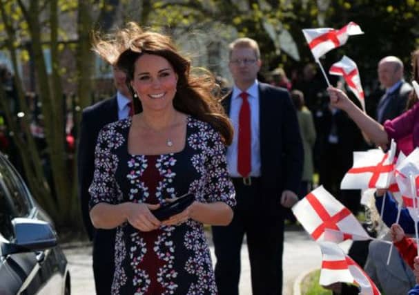 She was greeted by pupils. Picture: PA