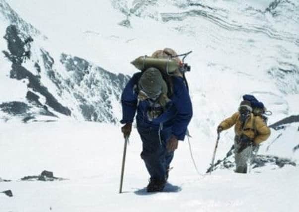 Hillary, left, and Tenzing on Everest. Picture: PA