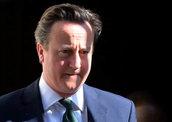 David Cameron: Told to pay back donation from Ian Taylor. Picture: Getty