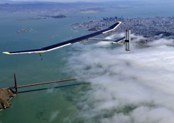The Solar Impulse flies over the Golden Gate Bridge in San Francisco. Picture: AP