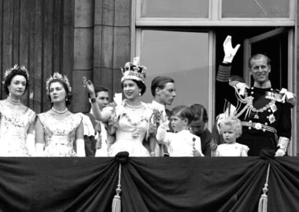Queen Elizabeth II waves from Buckingham Palaces balcony after her coronation in 1953, but a future monarch might also require a coronation in Scotland. Picture: AP