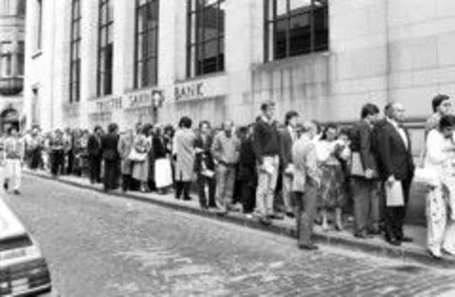 People queue to buy shares in TSB in 1986  the beginning of the banks downfall. Picture: Hamish Campbell