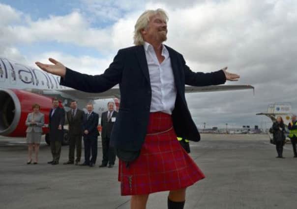 Sir Richard Branson arriving in Edinburgh Airport wearing a Harris Tweed Kilt. Picture: Getty
