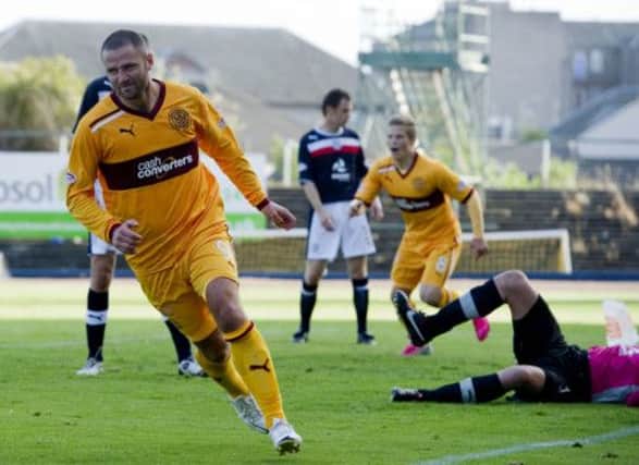 Michael Higdon is the favourite to win the Players'  Player of the Year award and be the SPL's top scorer. Picture: SNS