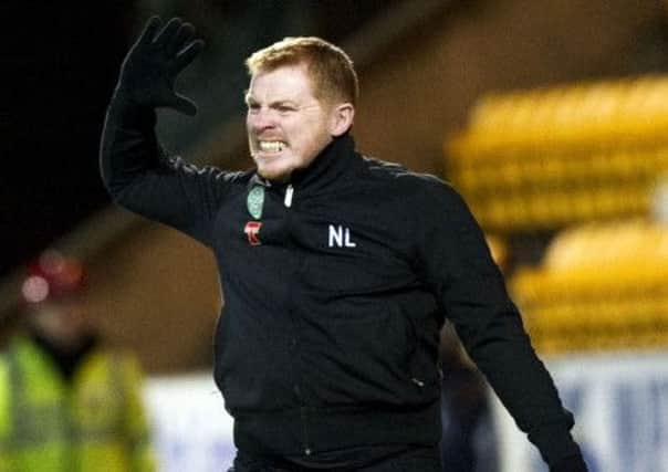 Neil Lennon feels his players have been 'heroic' all season. Picture: SNS