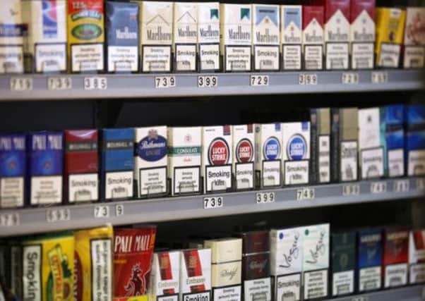 Cigarettes on display in a shop, but would bringing an end to this stop youngsters smoking? Picture: Getty