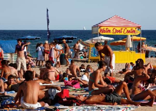 Many holidaymakers are opting to share their trips with their friends or extended family in an attempt to cut costs. Picture: Getty