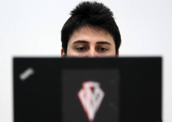 Hacker: Making your passwords more complex will lessen the risks of a cyber attack. Picture: Reuters