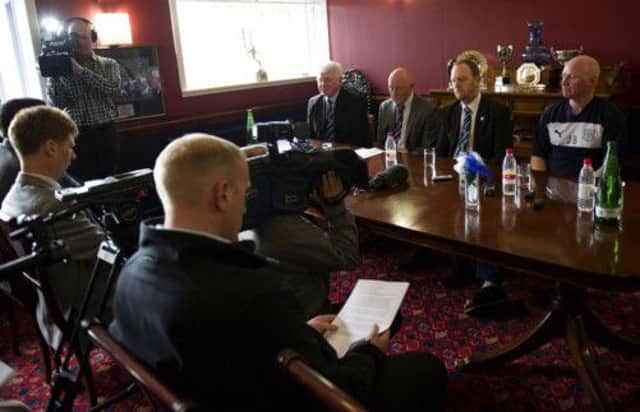 Dundee's directors and chief executive announce the appointment of John Brown, far right. Picture: SNS