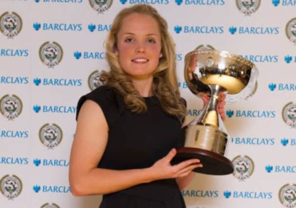 Kim Little with the PFA Player of the Year trophy. Picture: PA