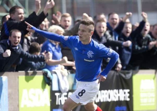 Rangers' Ian Black salutes the travelling fans. Picture: PA