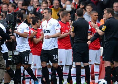 Robin van Persie steps onto the pitch at the Emirates Stadium. Picture: Getty