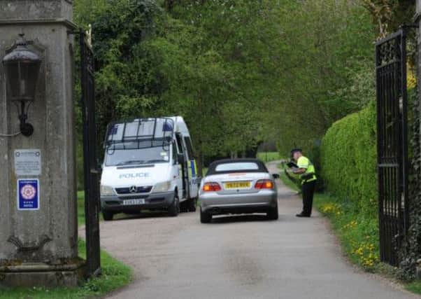 Police at the gate to Down Hall Country House Hotel in Hatfield Heath, Essex. Picture: PA