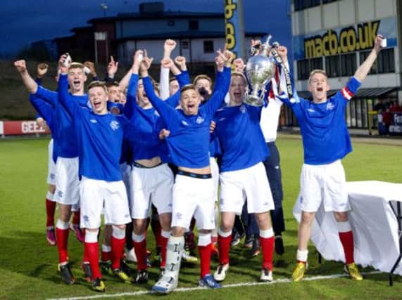 Rangers celebrate their victory. Picture: SNS