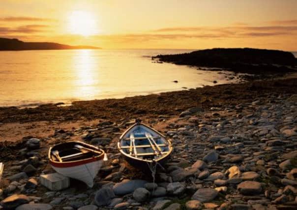 Boats on Norwick beach at sunrise, Unst, Shetland Islands