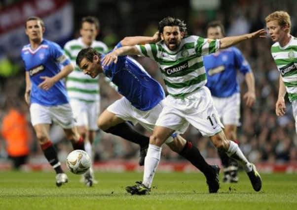 Lee McCulloch tussles with Paul Hartley during the 2009 League Cup final. Picture: Reuters