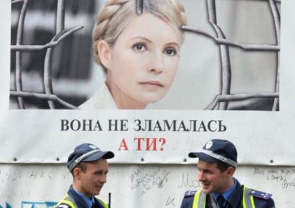 In Kiev, where many disdain politics, the pro Yulia Tymoshenko poster says She is not broken. What about you? Picture: Getty