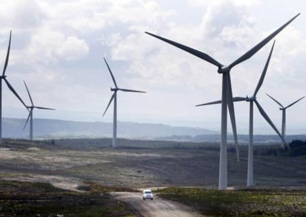 Wind farms such as this could be banned from designated scenic areas in Scotland, under new government plans. Picture: PA