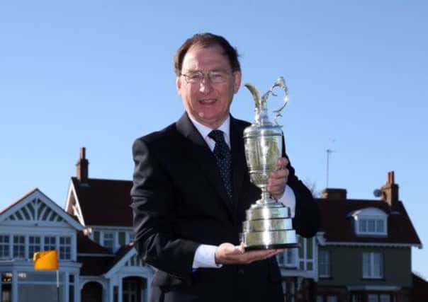 R&A championship committee chairman Jim McArthur with the Claret Jug at Muirfield. Picture: Getty Images