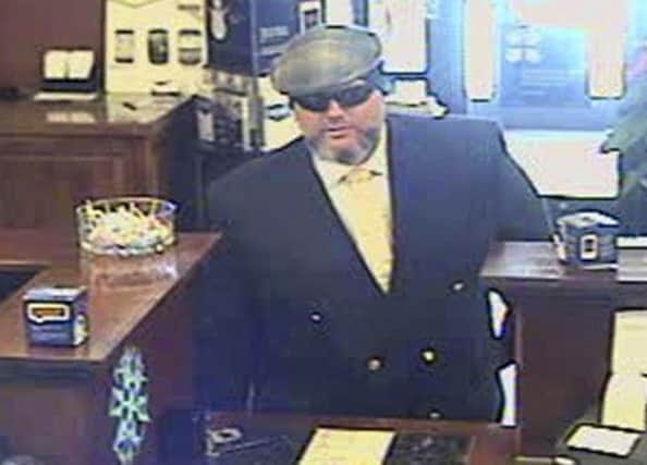 CCTV footage shows Corey Donaldson in a Jackson branch of US Bank while committing the robbery. Picture: AP