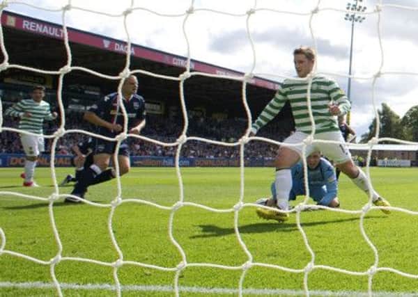 A request to bring forward opening hours before Celtic's visit to Dingwall has been rejected. Picture: SNS