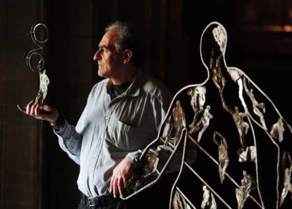 Artist Randy Klein pictured with part of his exhibition at St Giles.  Picture: Ian Rutherford
