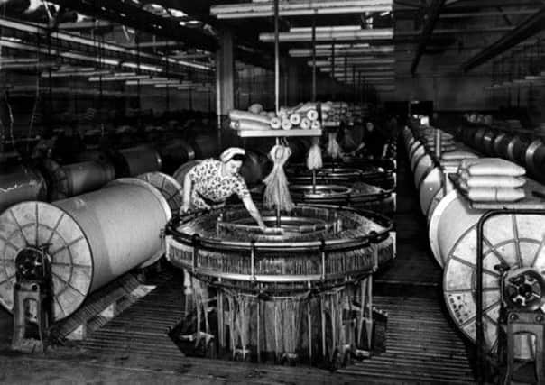 A woman working at a circular loom in a Dundee jute mill in 1957. Picture: Complimentary