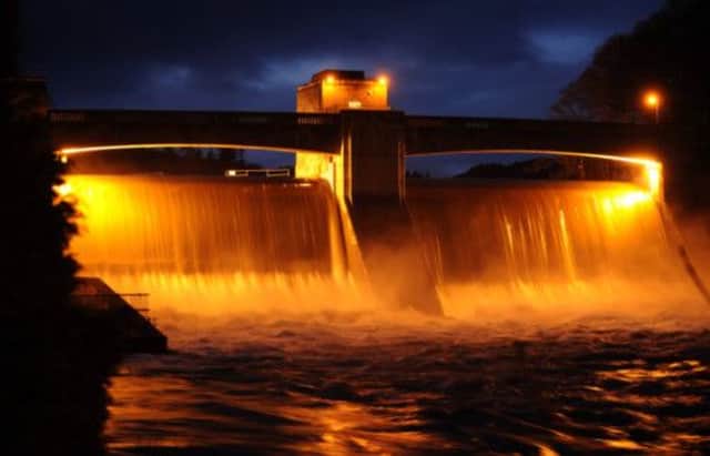 Water cascades over Pitlochry Dam. Picture: Reuters