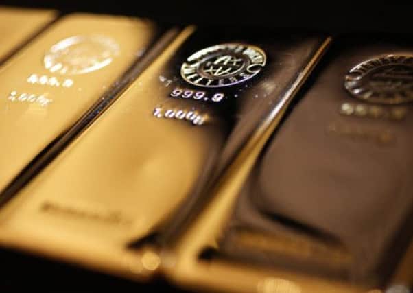 Investment specialists have long regarded gold as a portfolio diversifier. Picture: Reuters