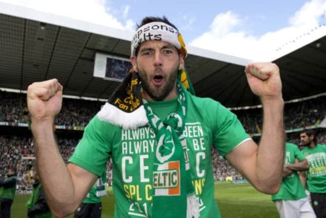 Joe Ledley celebrates Celtic's SPL title. Picture: SNS