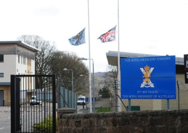 Flags fly at half-mast at the soldiers' base near Penicuik. Picture: Ian Rutherford