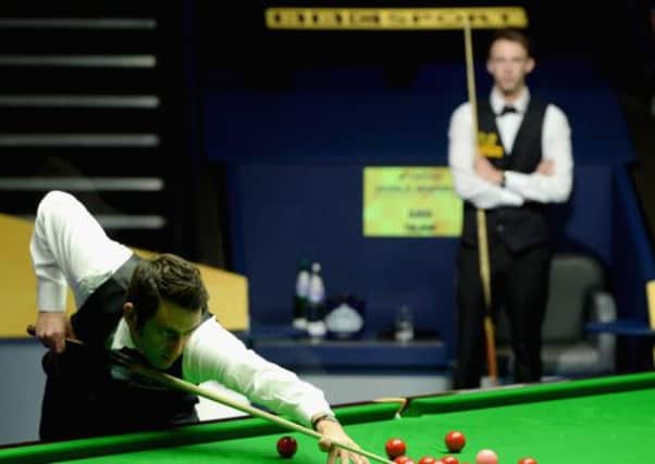 Despite his lengthy absence from the game Ronnie O'Sullivan was able to build a lead over the talented Judd Trump last night.  Picture: Getty