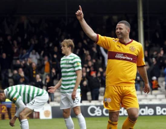 Motherwell striker Michael Higdon is favourite to win the PFA Scotland Player of the Year award this weekend. Picture: PA