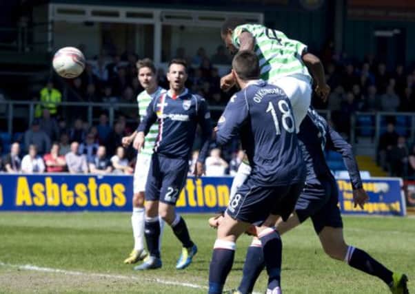 Efe Ambrose heads towards goal. Picture: SNS